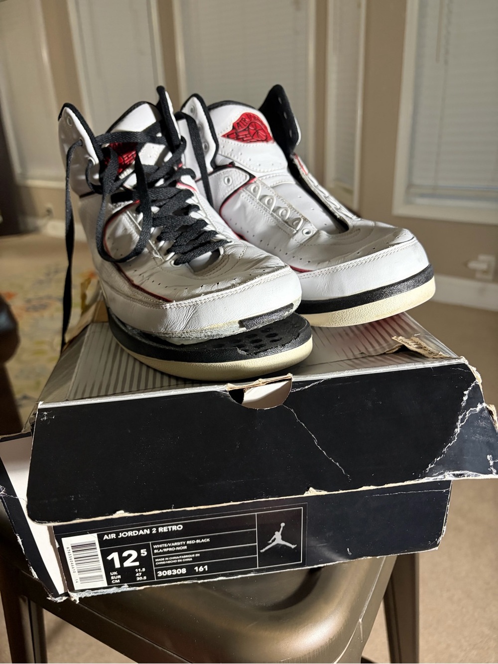 Air Jordan 2 Retro Men’s White/Red Basketball Shoes size 12.5 needs repairs